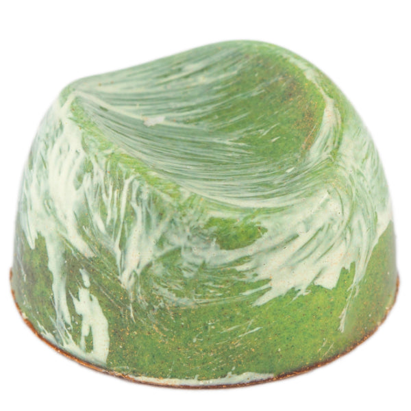 An herbal citrus explosion!  This dark chocolate shell is filled with a lemon thyme white chocolate ganache, and is finished with a dried lavender and thyme salt.